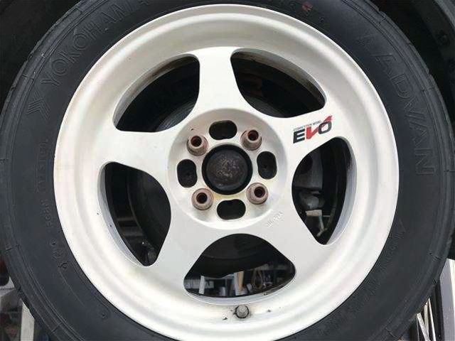 Aftermarket rim.