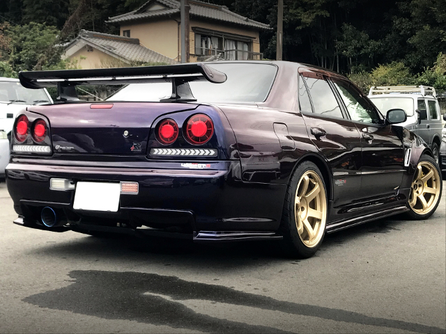 Rear exterior of ER34 SKYLINE 4-DOOR 25GT-X with 4-door GT-R style.