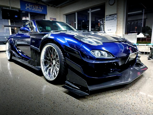 Front exterior of TCP-MAGIC WIDEBODY FD3S RX-7 TYPE-R.