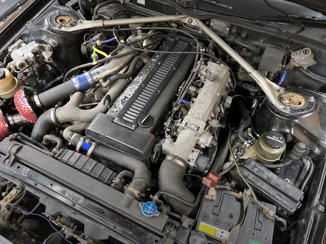 1JZ-GTE twin turbo engine.