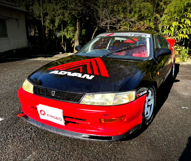 Front exterior of AE101 COROLLA LEVIN SJ with ADVAN RACING livery.