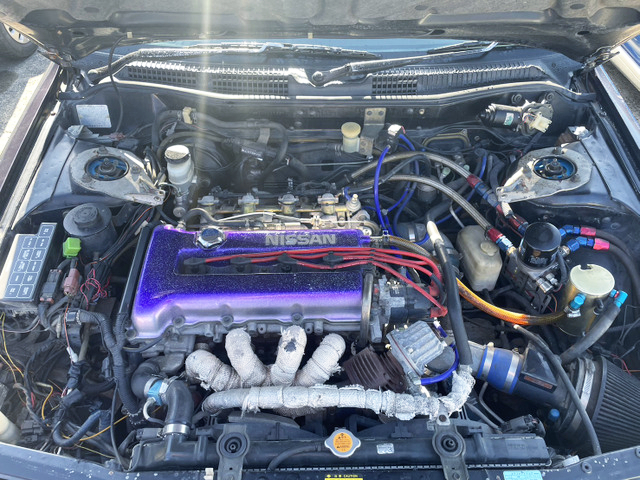 SR20DET with AFTERMARKET TURBO.