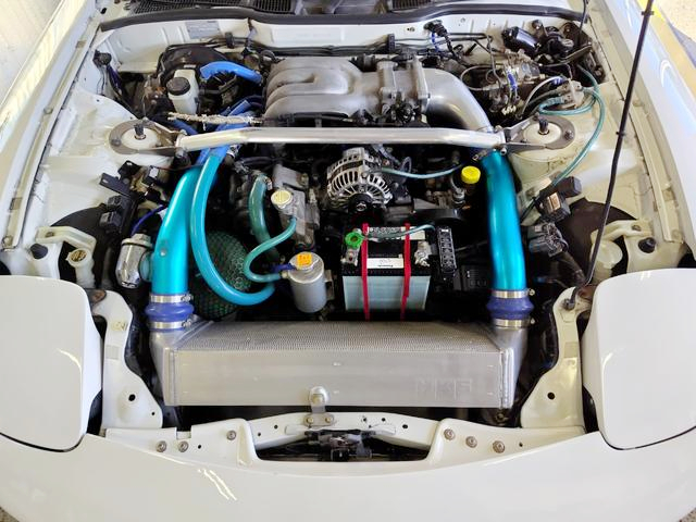 13B-REW engine with HKS TO4Z single turbo.