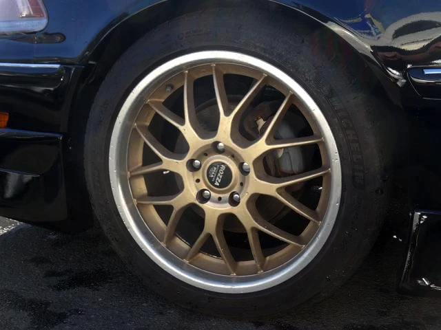 Aftermarket rim.