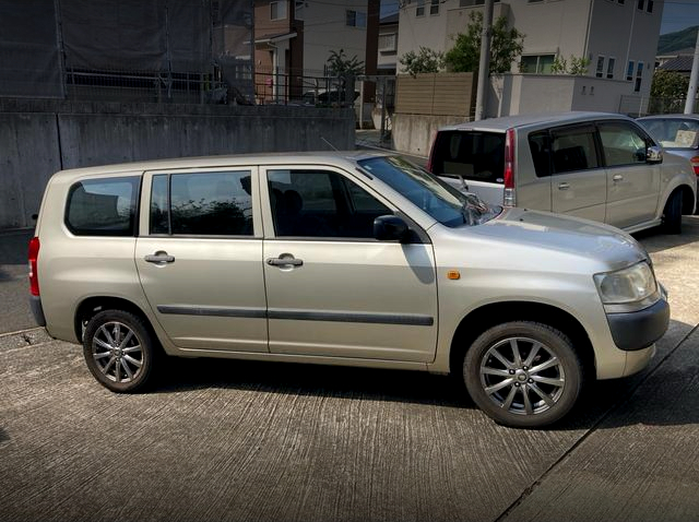 Side exterior of Lifted NCP58G PROBOX WAGON.