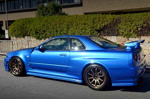 Rear-side exterior of R34 SKYLINE GT-R With T517Z TWIN TURBO.