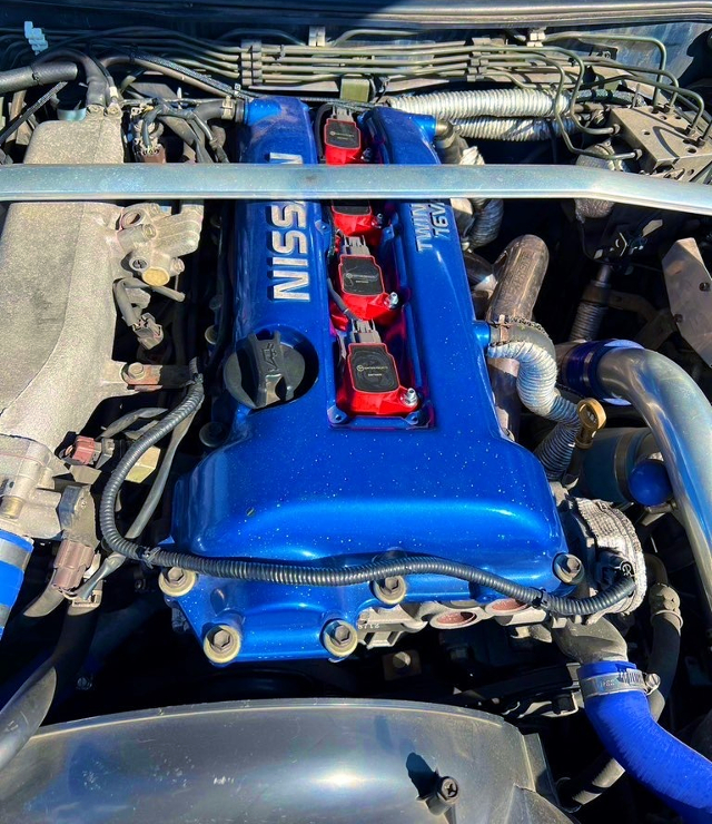 SR20DET with HKS GT-SS turbo.