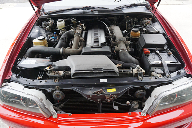 1JZ-GTE twin turbo engine.