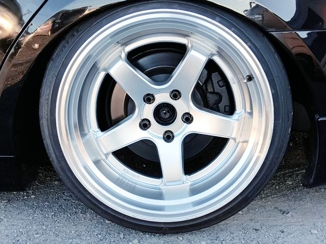 Aftermarket rim.