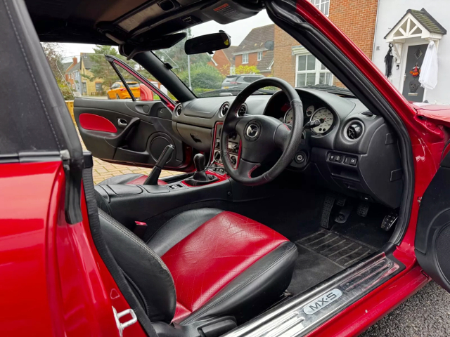 Driver side interior of 2nd Gen MAZDA MX-5.