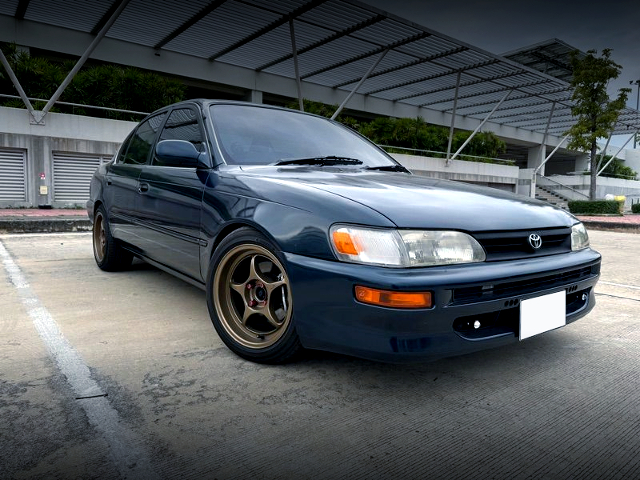 Front exterior of AE101 TOYOTA COROLLA 4-DOOR.