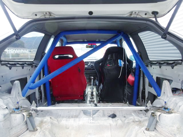 Roll cage and Two seats.