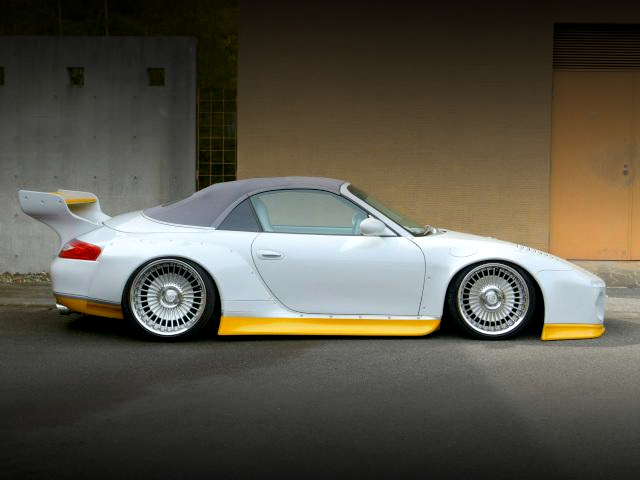 Side exterior of OLD＆NEW SLANT NOSE WIDEBODY PORSCHE 996 CARRERA CABRIOLET.