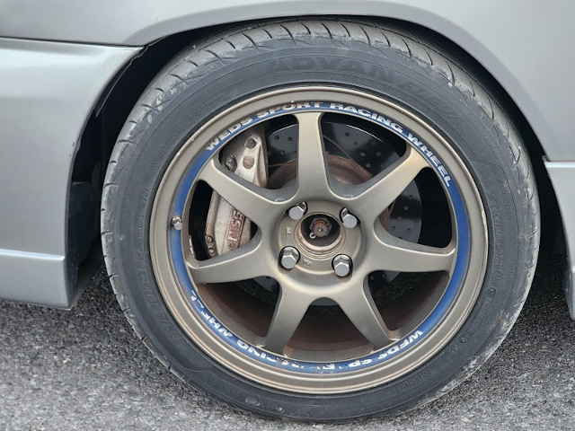 NISSAN 4-pot caliper.