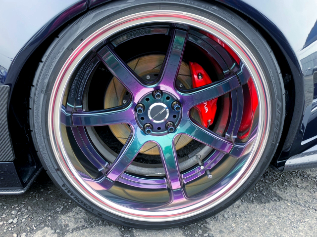 Aftermarket rim.