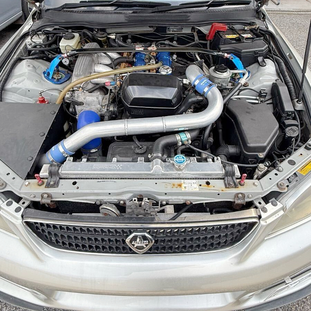 3S-GE 2.2L stroker and HKS GT2 turbo.