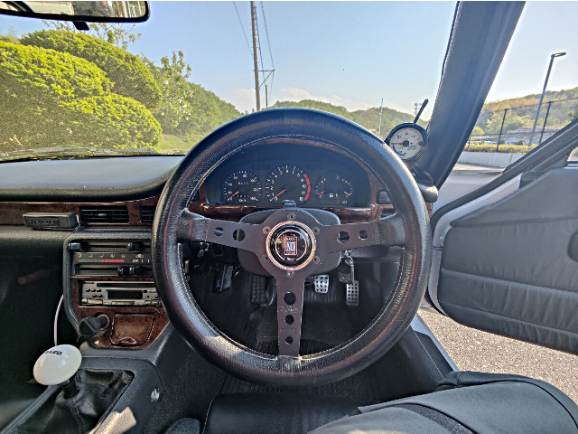 Speed cluster and steering wheel of EA11R SUZUKI CAPPUCCINO.