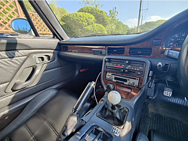 Passenger side dashboard of EA11R SUZUKI CAPPUCCINO.
