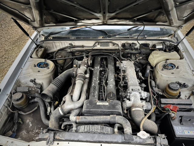 1JZ-GTE twin turbo engine.