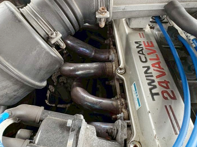 Aftermarket exhaust manifold on 1G-GE.