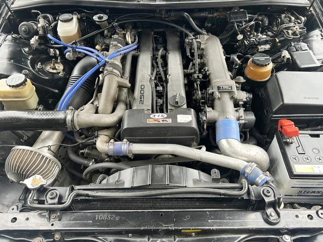 1JZ-GTE Twin turbo engine.