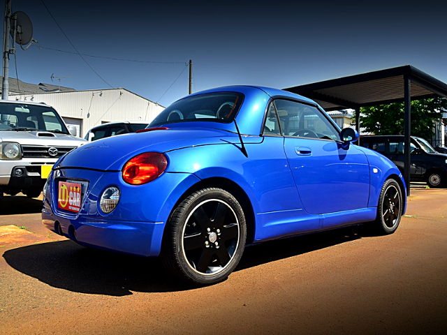 Rear exterior of L880K DAIHATSU COPEN.