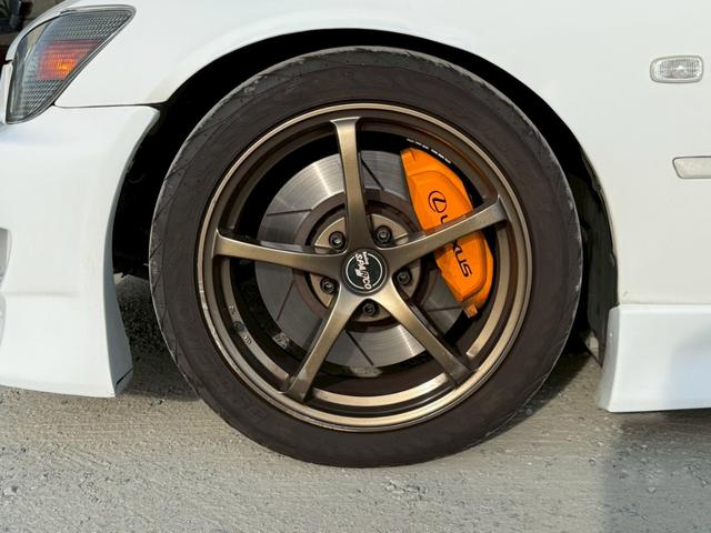 Front rim and Brake caliper.