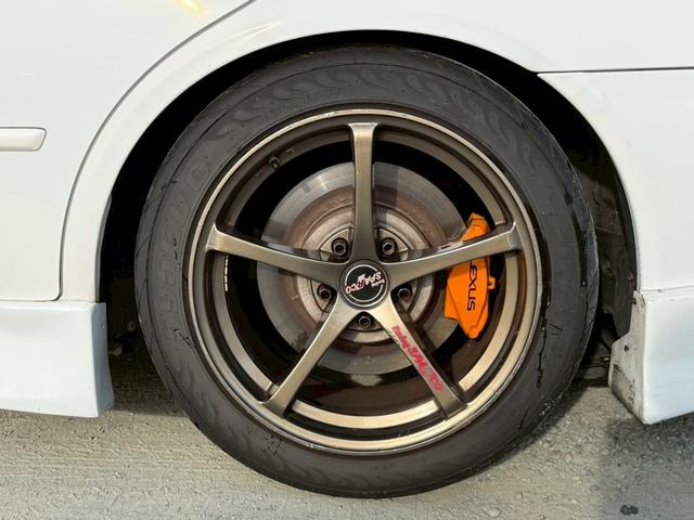 Rear rim and Brake caliper.
