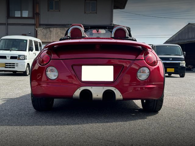 Rear exterior of L800K DAIHATSU COPEN.
