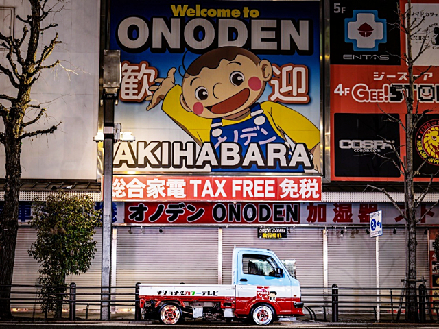 Side exterior of DA16T SUZUKI CARRY KC AC PS 3-WAY OPEN.