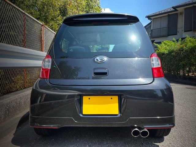 Tail light exterior of DAIHATSU ESSE CUSTOM.