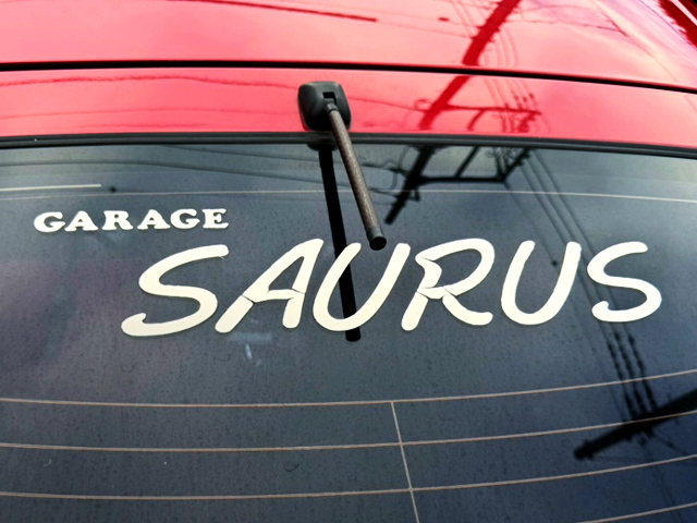 GARAGE SAURUS Sticker.