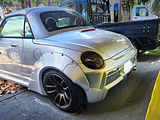 Rear exterior of WIDEBODY L880K DAIHATSU COPEN.