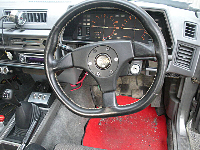 Speed cluster and Steering wheel of DR30 SKYLINE 2-DOOR.