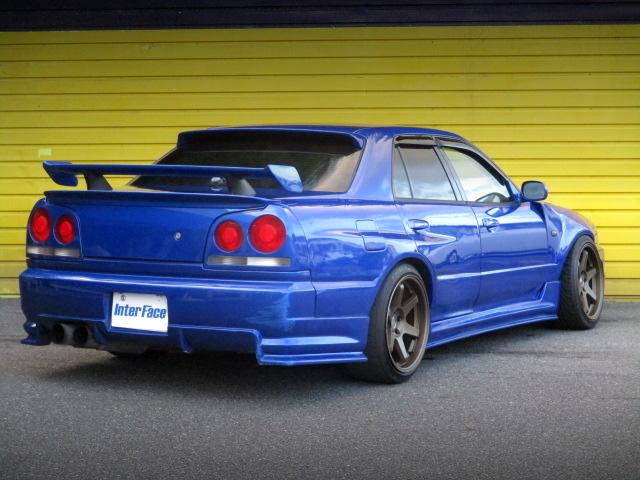 Rear exterior of GT-R STYLE WIDEBODY ER34 SKYLINE 4-DOOR 25GT-X.