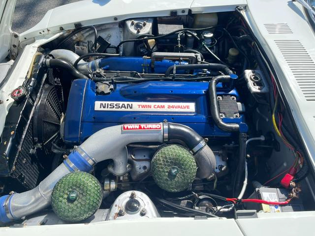 RB26 2600cc Twin turbo engine.
