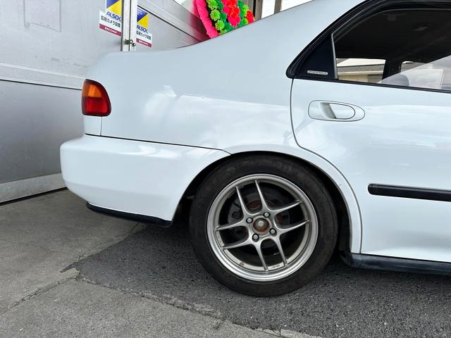 Rear Aftermarket Rim.