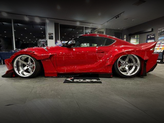 Left side exterior of KUHL RACING 90R-GTWR SPEC-D WIDEBODY DB06 SUPRA RZ.