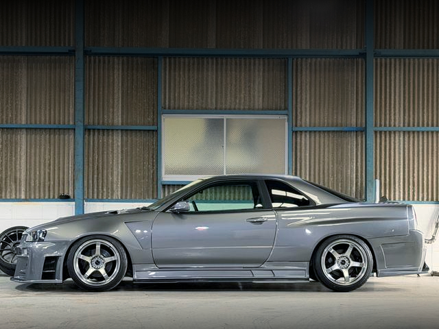 left-side exterior of KUHL-RACING WIDEBODY ER34 SKYLINE 2-DOOR 25GT TURBO.
