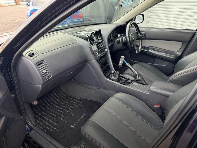 Interior Dashboard of URAS WIDEBODY R34 SKYLINE 4-DOOR.