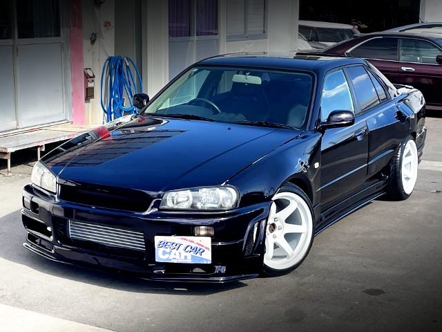 Front exterior of WIDEBODY ER34 SKYLINE 4-DOOR 25GT-X TURBO.