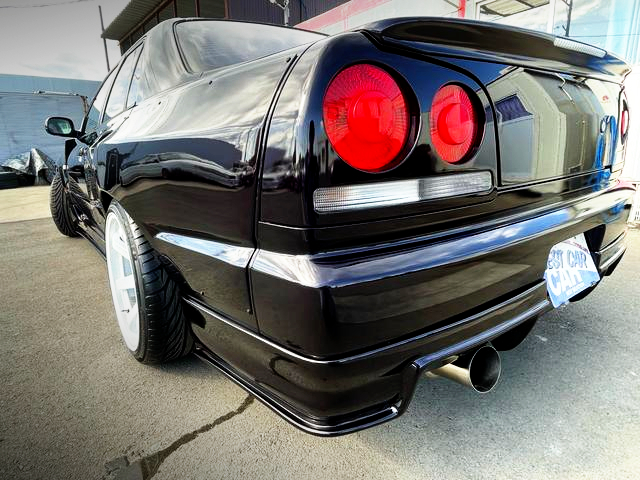 Rear exterior of WIDEBODY ER34 SKYLINE 4-DOOR 25GT-X TURBO.