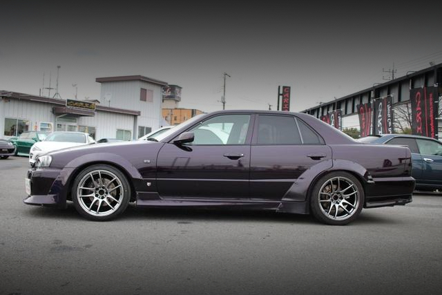 Left-side exterior of WIDEBODY ER34 SKYLINE 4-DOOR 25GT TURBO.
