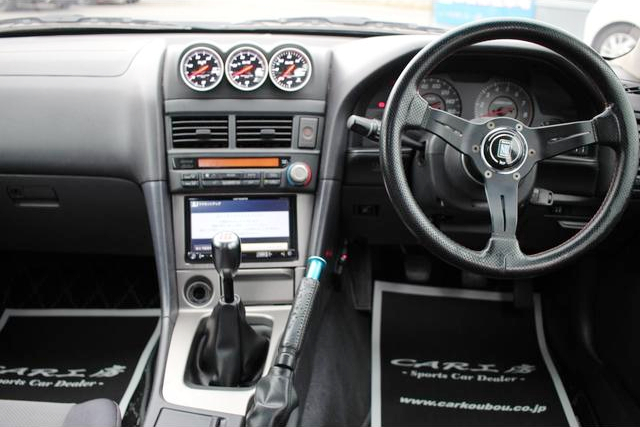 Dashboard of WIDEBODY ER34 SKYLINE 4-DOOR 25GT TURBO.