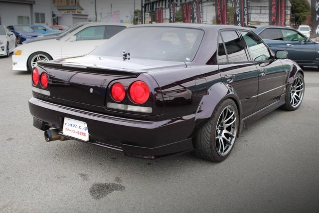 Rear exterior of WIDEBODY ER34 SKYLINE 4-DOOR 25GT TURBO.