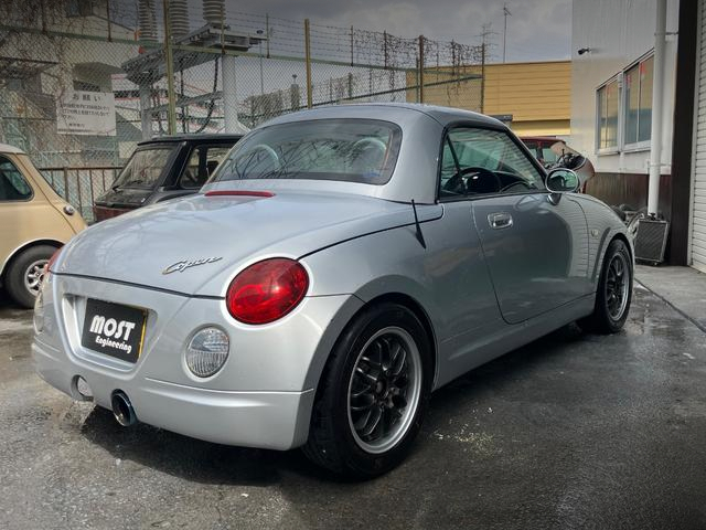 Rear exterior of L880K DAIHATSU COPEN.