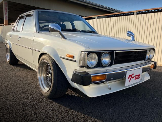 Front exterior of 4th Gen E70 COROLLA 4-DOOR 1500 SE.