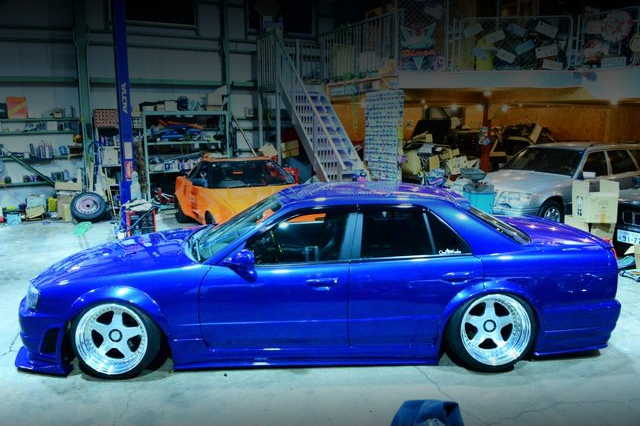 Side exterior of WIDEBODY R34 SKYLINE 4-DOOR GT.