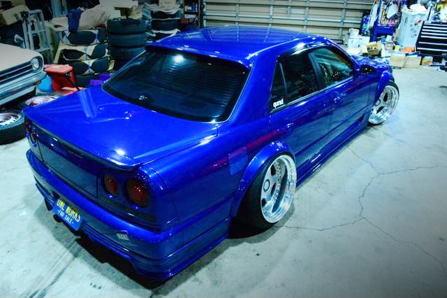 Rear exterior of WIDEBODY R34 SKYLINE 4-DOOR GT.