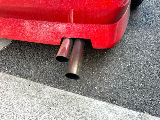 Aftermarket Dual Muffler.